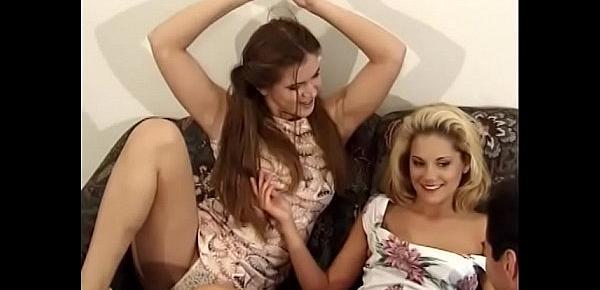  Vampish blonde is sucking rod while brunette fucking her with strapon